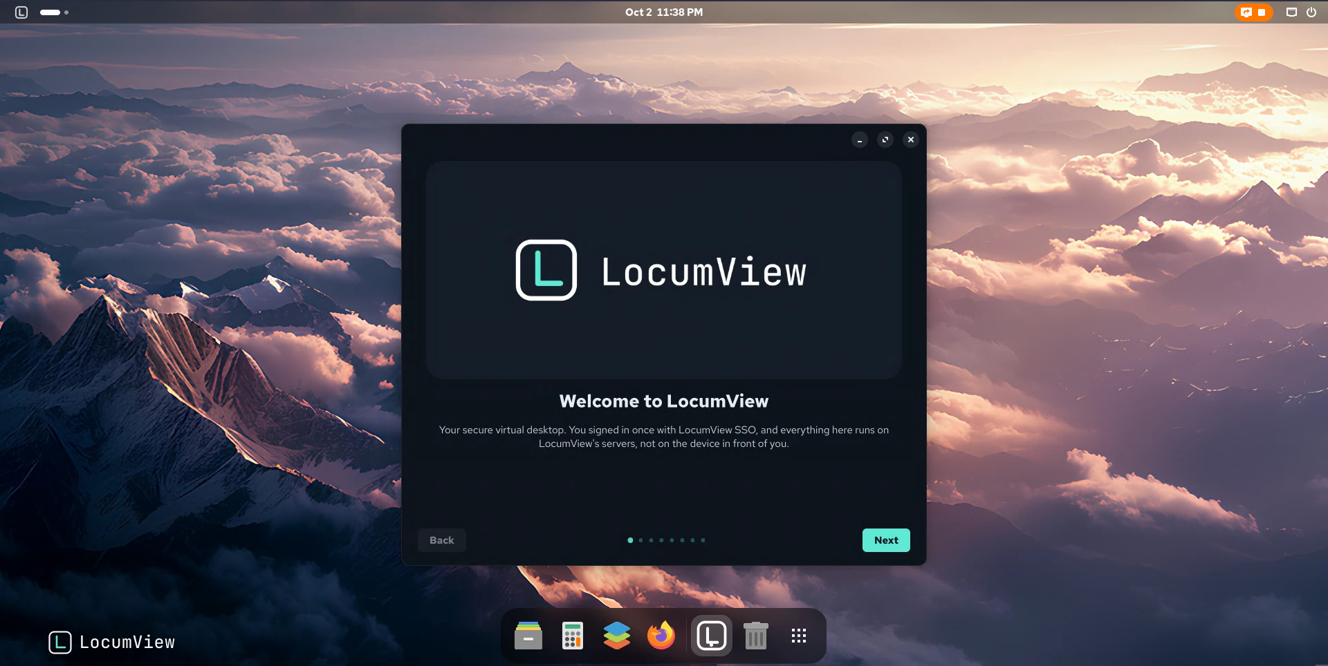 The LocumView GNOME desktop in a browser session: the LocumView mark and workspace dots in the top bar, a mountain wallpaper, the LocumView Tour welcome screen open in the middle, and a dock with Files, Calculator, ONLYOFFICE, Firefox, the tour and the app grid.
